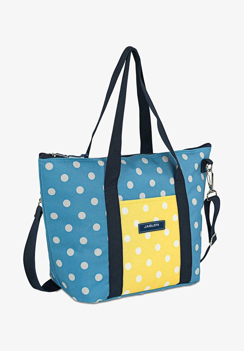 Bolsa tote de lona con un cuerpo azul y lunares blancos, y un bolsillo delantero amarillo. Incluye asas negras y cierre de cremallera.