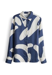 Chemise à manches longues boutonnée avec de grands motifs abstraits de coups de pinceau blancs sur fond bleu et un col pointu.