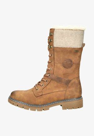 Bruine veterschoen tot de knie met een gestructureerde nep leren bovenwerk, een zachte fleece kraag en een robuuste zool met een uitgesproken profielontwerp.