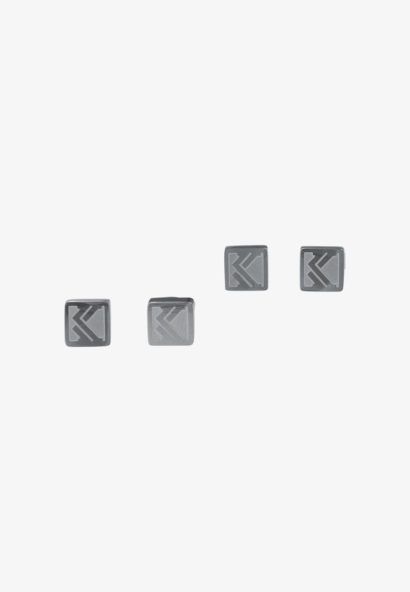 Grå firkantede manchetknapper med indgraverede geometriske mønstre. Glat metallisk finish og afrundede kanter. Sæt med to par.