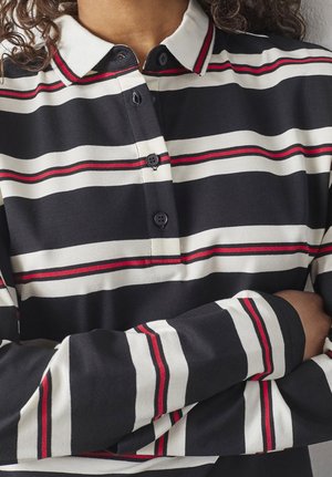 Langærmet polo t-shirt med vandrette striber i sort, hvid og rød. Inkluderer en krave, knaplukning og ribbede manchetter.