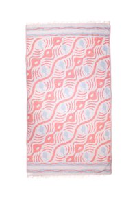 Rectangular towel with coral pink and light blue wavy lines and fish patterns, fringed edges, on white background.
