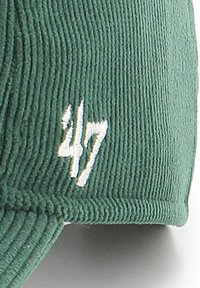 Green corduroy cap with white embroidered "47" logo on the front. Features ridged texture and a curved brim.