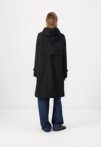 Barbour International LONGLINE KYRA WATERPROOF JACKET - Waterproof jacket - black