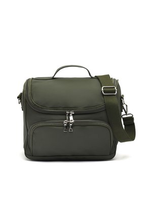 Olive green nylon bag with double zippers, a top handle, adjustable strap, front pocket, and smooth texture; rectangular shape.