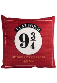 Cuscino decorativo rosso con la scritta "Binario 9¾" in bold nero, un logo circolare bianco e "Hogwarts Express" sotto in oro. Sfondo a motivo diamante.