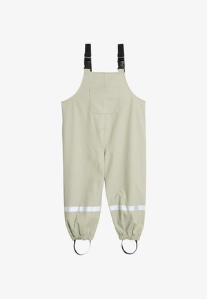 Beige waterproof overalls with adjustable black straps, front chest pocket, elastic cuffs, reflective bands above ankles, and foot straps.