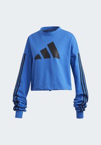 Sweat-shirt bleu court en tissu à texture lisse. Porte un logo adidas noir et trois bandes noires sur les manches.