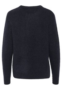 Tume meriinovillane särk ümmarguse kaelaaugu, pikkade varrukate ja pehme, tekstuurse viimistlusega. Tagantvaates on särk lõdva voolu ja minimaalsete detailidega.