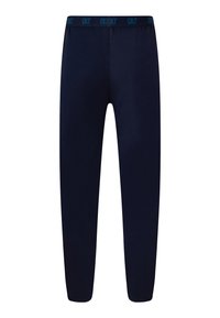 Navyblå joggers lavet af blødt stof, med en smal pasform og en elastisk linning med kontrasterende CR7-logo. Ingen andre detaljer synlige.