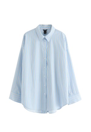 Skjorte med knapper foran lavet af lyseblåt stof med vertikale hvide og gule striber, krave og lange ærmer med manchetter, der kan knappes.
