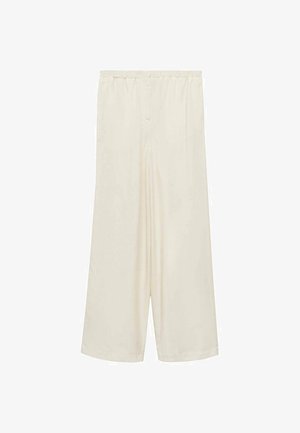 Cremefarvede vidde bukser med elastisk liv og blød, glat stof. Har en plisseret design og en løs, flydende form.