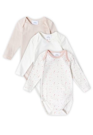 Three long-sleeve baby bodysuits: one pink striped, one solid white, and one white with a pink star and moon print. Soft cotton fabric.
