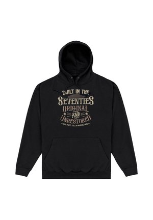 Czarna bluza z kapturem z przednią kieszenią i napisem w stylu vintage: „Built in the Seventies Original and Unrestored - Some parts still in working order.”
