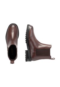 Brown leather ankle boots with elastic side panels, round toe, and textured rubber sole. Includes a pull tab for easy wear.