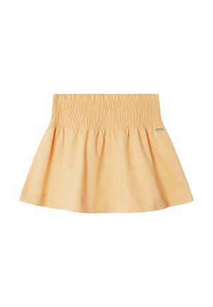 Jupe orange clair avec une large ceinture smockée et un bas évasé, réalisée en tissu doux, présentée sur un fond blanc.