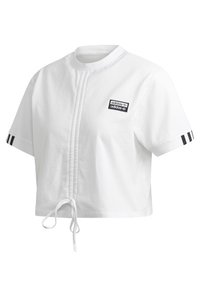 Vit kortärmad cropped Adidas-tröja med svarta ränder på ärmarna, detaljer med sömmar fram och Adidas-logotyp på bröstet.