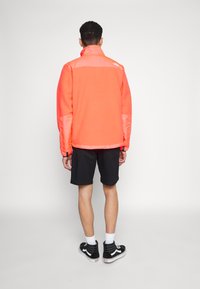 The North Face DENALI - Flisinė striukė - brilliant coral