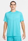 STRIDE TOP - Sport T-Shirt - dusty cactus
