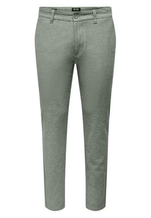Pantalones de lino verde con una silueta recta, cierre de cremallera, bolsillos delanteros y una textura suave. Presenta un cierre de botón único en la cintura.