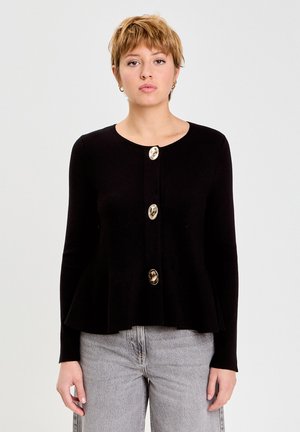 Cardigan negro de manga larga con corte peplum, con botones circulares dorados en la parte delantera. Material suave, textura lisa y diseño sencillo.