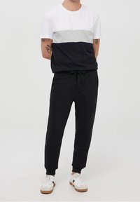 Terranova Tracksuit bottoms - black