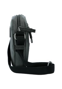 Gray leather crossbody bag with zipper closure, adjustable strap, and silver hardware. Textured surface with stitching detail. Compact rectangular shape.