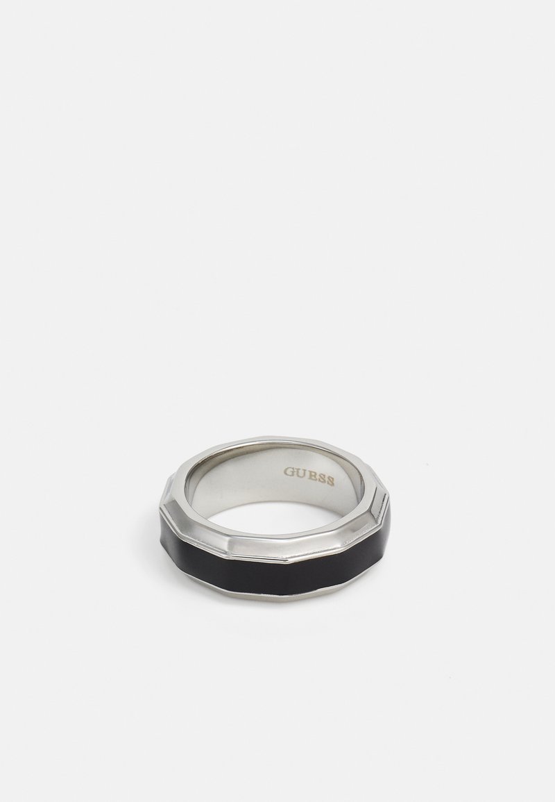 Black and silver ring with an octagonal shape, featuring a polished silver band and a matte black inset. Marked with "GUESS" inside.