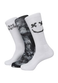 Trzy pary skarpet: jedna biała z napisem "Los Angeles", jedna biała z uśmiechniętą buźką, a jedna czarna z wirującym wzorem. Materiał mieszanka bawełny.