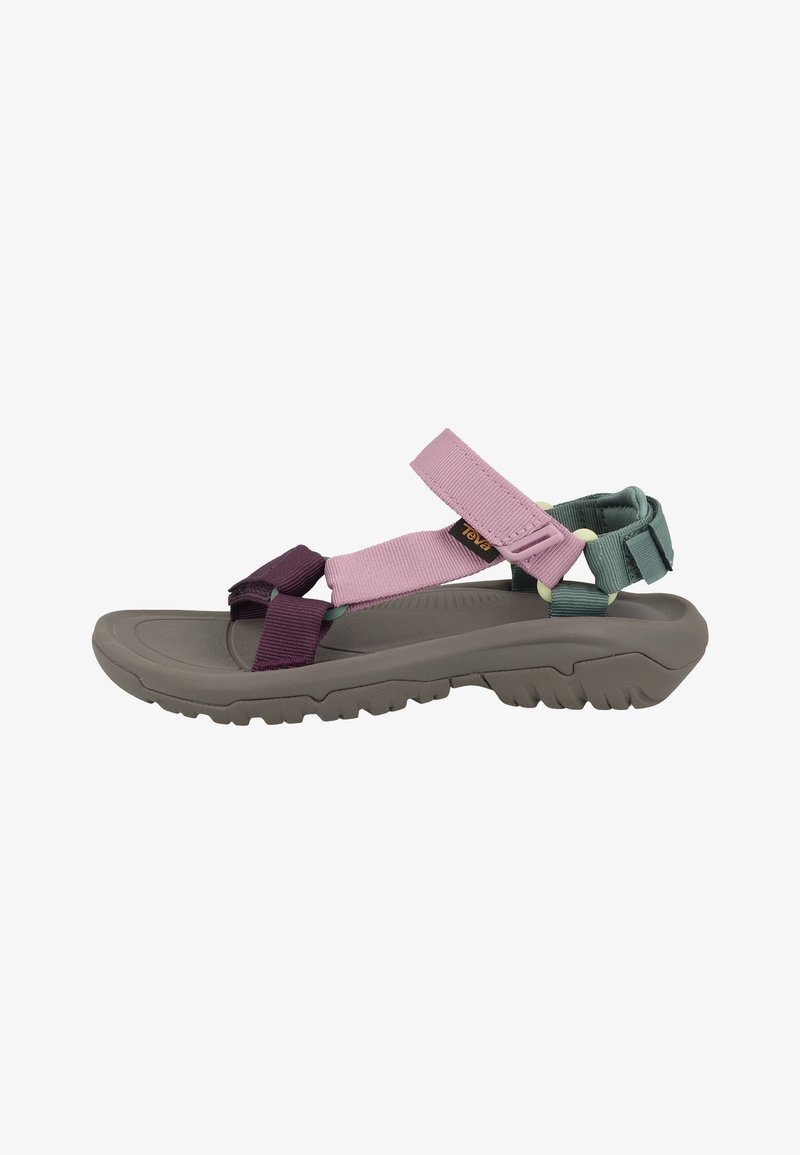 Sporty open-toe sandal featuring a gray rubber sole, purple and pink straps, and green accents for secure adjustment. Textured footbed for grip.