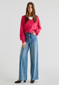 Scalpers Neule - raspberry