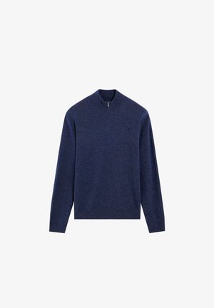 Navyblauwe pullover trui met een opstaande kraag en ritssluiting. Gemaakt van zachte stof, met lange mouwen en een aansluitende zoom, geschikt om in laagjes te dragen.