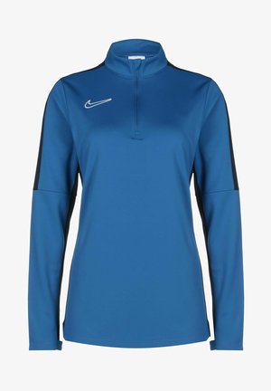 Blue athletic pullover with a high collar, zip closure, long sleeves, black side accents, and a white Nike logo on the chest.