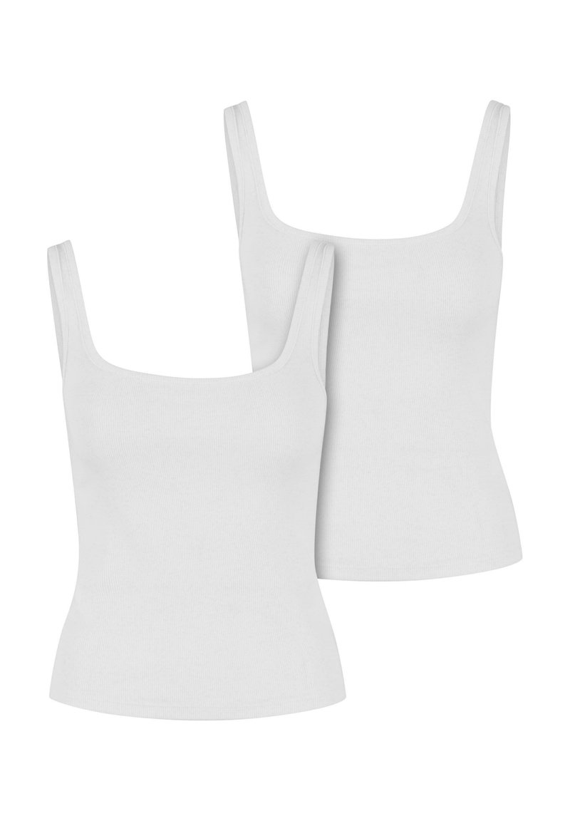 Top à bretelle pour l'été. Matière fluide et élégante pour femme