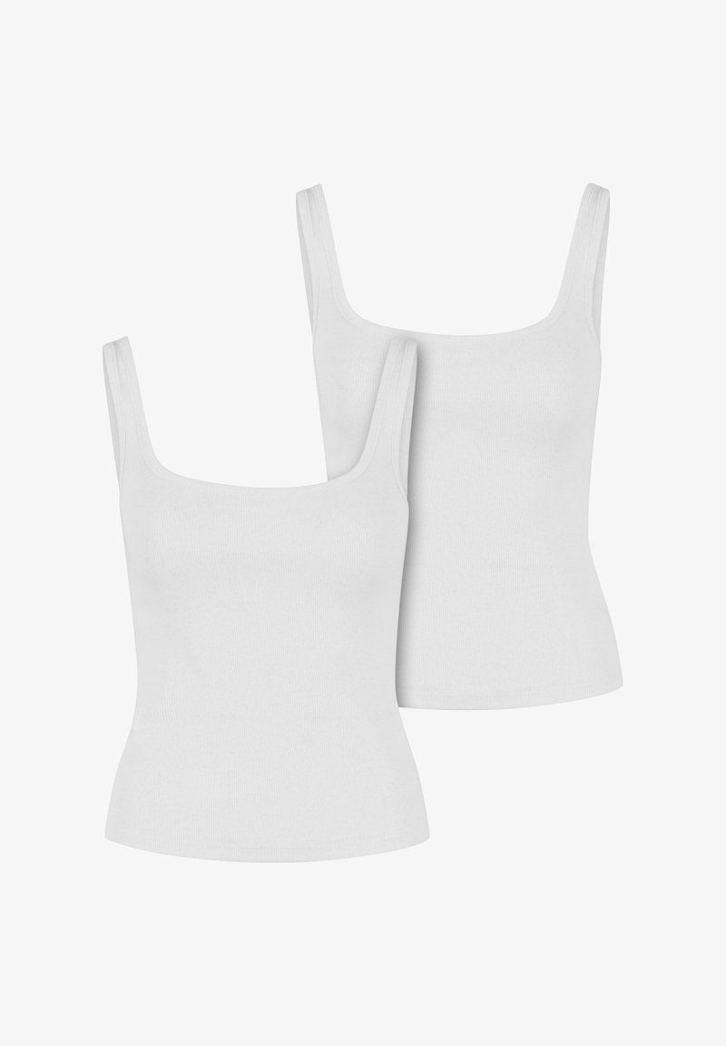 Top à bretelle pour l'été. Matière fluide et élégante pour femme Top à bretelle pour l'été. Matière fluide et élégante pour femme