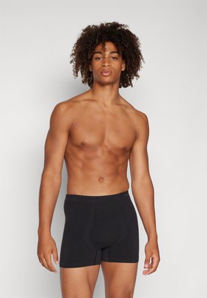 Schwarze Boxershorts aus weichem Material, mit eng anliegender Passform, elastischem Bund und einem flachen Nahtdesign für zusätzlichen Komfort.