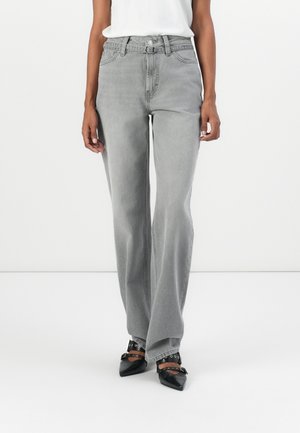 Gray high-waisted jeans with a straight-leg fit, featuring a button and zipper closure, belt loops, and front pockets.