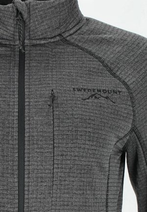 Grå zip-up jacka med en texturerad tyg, hög krage och svarta accenter. Har en logotyp och en zip-försedd bröstficka. Mjuk och justerbar.