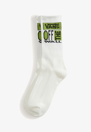 Hvide crew-sokker med ribstrikkede manchetter med grønt og sort "Vans Off The Wall" logo nær toppen.