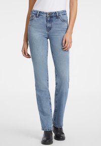 Light blue denim jeans with a high waist and straight leg design. Prominent stitching, two front pockets, and contrast button closure.