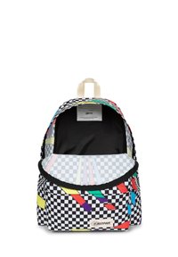 Backpack with a checkered pattern, featuring colorful geometric accents and a black interior. Sturdy fabric with dual shoulder straps.