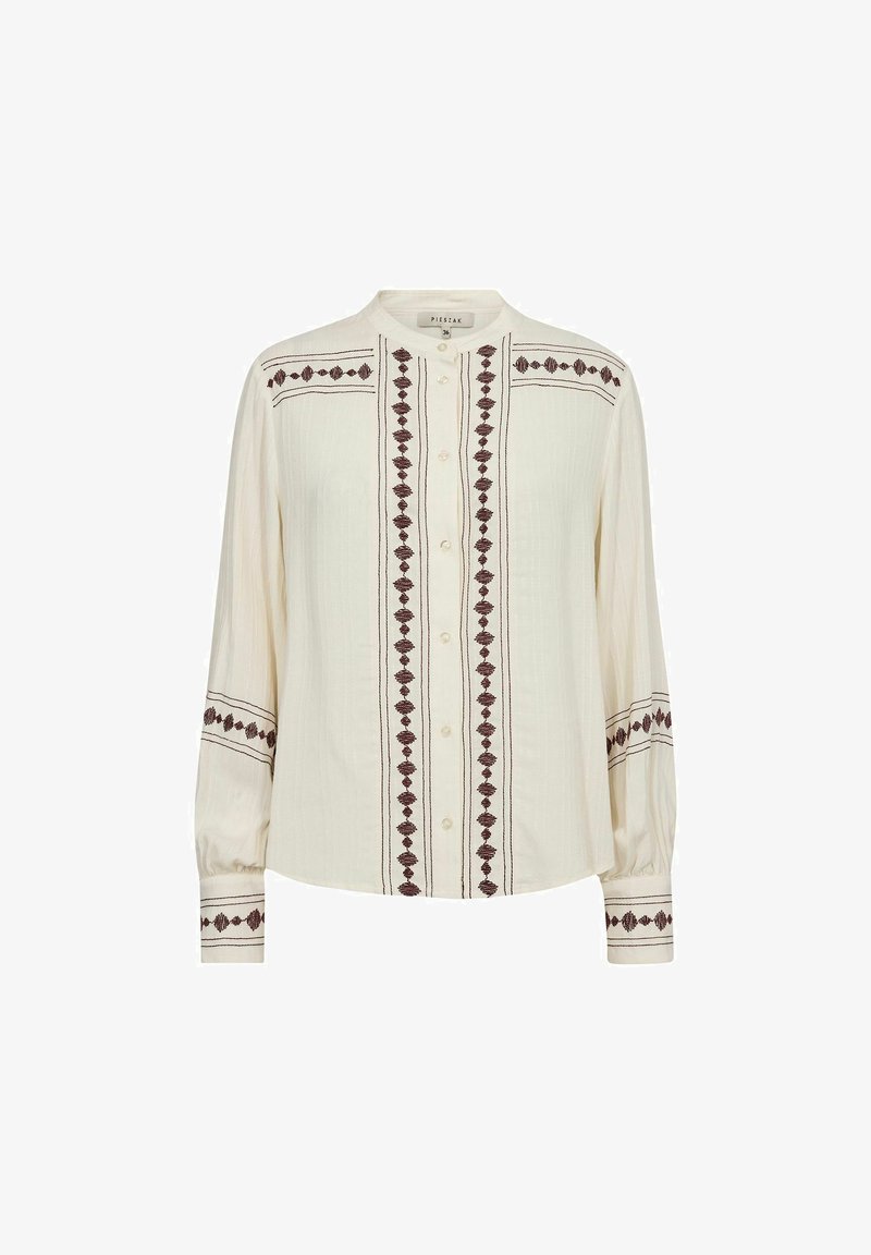 Cremefarbenes Langarmhemd mit Knopfv front, mit filigraner weinroter Stickerei entlang der Mitte und Ärmel. Strukturierter Stoff.