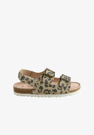 Sandal s uzorkom leoparda s dva podesiva kopčanja, mekanim uloškom i teksturiranom potplatom. Paleta boja sadrži bež i tamnosmeđe akcentne tonove.