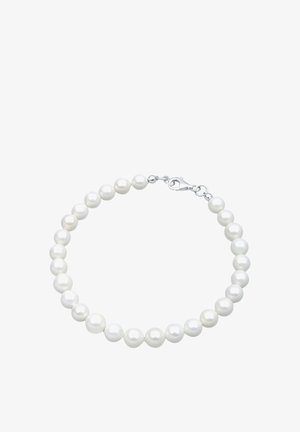 Baltas perlų apyrankė, susidedanti iš apvalių perlų su lygiu paviršiumi, užsegama sidabro atspalvio vėžlio tipo užsegimu.