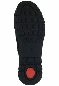 Suela de zapato de goma negra con un patrón de relieve texturizado. Presenta un acento circular rojo marcado "Tamaris Comfort" y tamaño 37.
