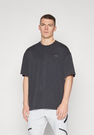 Under Armour LOGO WASH - Basic T-shirt - black/white