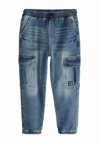 Denim darba bikses vidēji zilos toņos ar elastīgu jostasvietu un auklu. Iekļauj divas sānu kabatas un divas lielas kabatas uz sāniem.