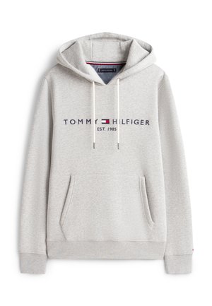 Gray hoodie made of soft fabric features a front pocket, drawstring hood, and printed "TOMMY HILFIGER EST. 1985" logo in dark blue and red.