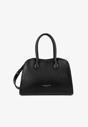 Sac à main Lancaster Paris en cuir noir avec double poignée et bandoulière amovible, forme rectangulaire aux bords supérieurs arrondis.