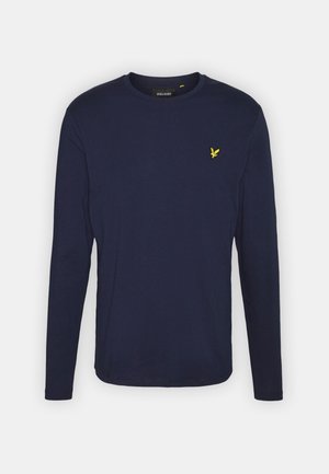 Navy long-sleeve t-shirt made of soft cotton, featuring a round neckline and a small yellow bird logo on the chest. Sewn hem and cuffs.